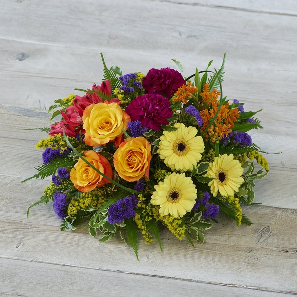 Funeral posy tribute made with the finest flowers